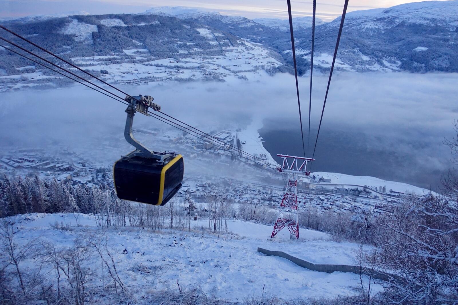 The Voss gondola above a snowy valley in Norway